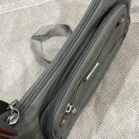 Baggallini. Brand new with tags. Grey with subtle cheetah print background. - Picture 3 of 12